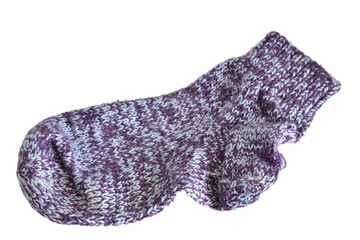 Warm woolen sock lies on a white background