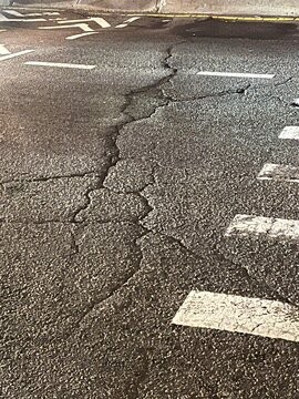cracked street on the lower east side new york city near the williamsburg bridge