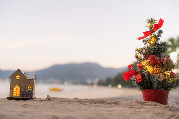 Cute and Christmas Tree House Relaxing on the Beach. Merry Christmas Holiday. Bright Background. Patong Beach, Phuket, Thailand.