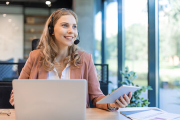 Customer support service. Close-up of caucasian friendly smiling woman, call center operator with...