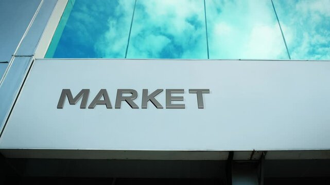 Market sign on a modern building, symbolizing commerce, trade, and business activity