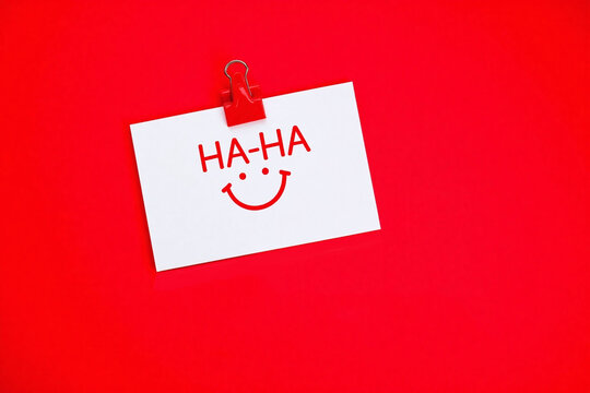 piece of paper with the words HA HA april fools day background