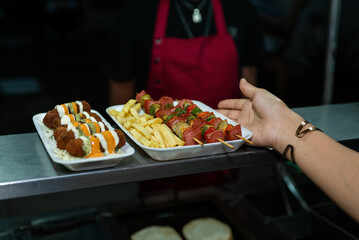 Delicious Street Food Skewers and Fries Served in Styrofoam Tray