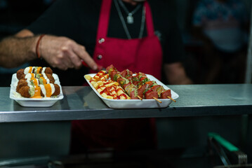 Delicious Street Food Skewers and Fries Served in Styrofoam Tray