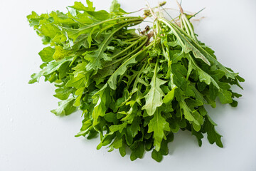Bunch of lush, green arugula gathered for preparing healthy meals full of flavor and freshness