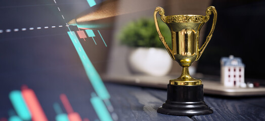 Achievement in Real Estate Investment: A Golden Trophy Symbolizing Success and Excellence in...