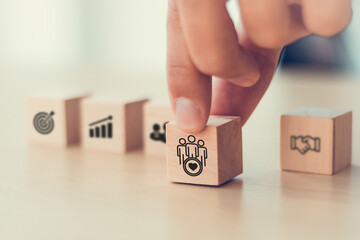 Business trust and success concept. Wooden blocks with trust, teamwork, customer, partner and...