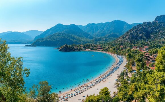 Breathtaking panoramic view of fethiye beach with tourists, clear waters, and majestic mountains