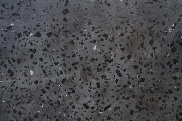 Texture of gray concrete terrazzo with black marble