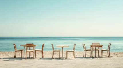 Empty beachside cafe tables under a clear sky.  Possible stock photo use  Travel, Vacation, Outdoor Dining