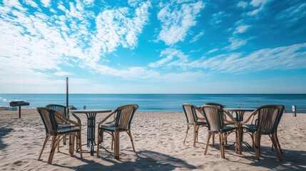 Fototapeta premium Beachside cafe tables under a vivid sky