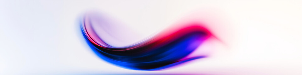 Naklejka premium Dynamic abstract composition featuring a swirling shape in shades of red and blue against a white background, creating a sense of motion and energy.