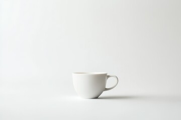 Fototapeta premium Simple white cup on a minimalistic background for design use