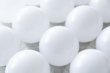 round white LED light bulb. many modern light bulbs on a white