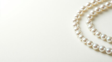 Elegant Pearl Necklace on Beige Background