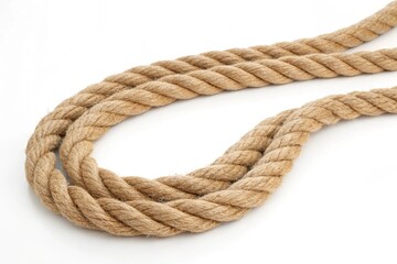 Obraz premium Thick Twisted Natural Fiber Rope Coiled on White Background