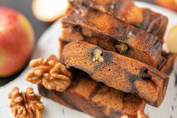 Organic apple pastila with walnut in board .  Vegan sweet food