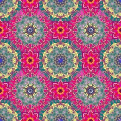 Delightful seamless spring pattern with mandalas, leaves and flowers in ethnic style in pink, green and yellow tones.