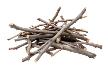 Dry wood pile isolated on white background with clipping path. Dry twigs pile ready for campfire, sticks, boughs heap for a fire, dry thin branches, brushwood.
