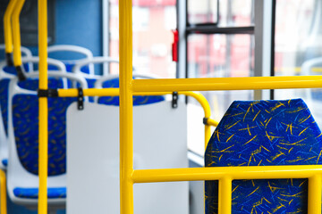 Empty bus interior. Seats without passengers. Public transport.