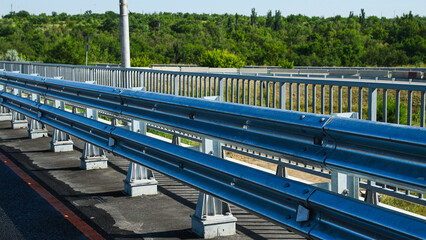 Metal road fence. Road safety.