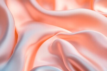 Soft peachy silk fabric drapes in elegant folds
