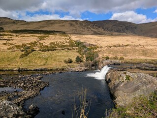 Beautiful landscape scenery, river Erriff surrounded by mountains near Aesleagh falls, county Mayo, Ireland, nature background