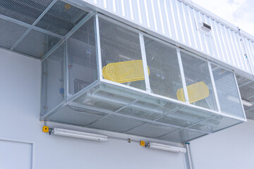 Fototapeta premium Steel meash cover around industrial motorizing fan for bird protection and for safety