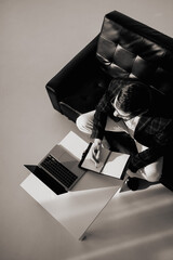 businessman with briefcase and laptop in the office