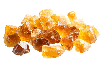 A pile of rough cut citrine gemstones with varying shades of yellow and brown on a white background