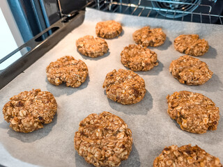 Delicious homemade oatmeal cookies baking in the oven