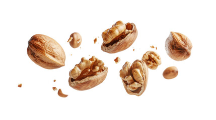 Cracked walnuts with shell fragments, isolated on transparent background