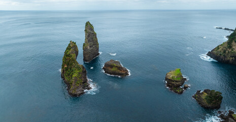 Aerial view over 'Baia de Alagoa' (Alagoa Bay) with seastacks, isle of Flores, Azores Porttugal