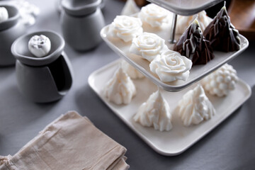 Elegant white and dark chocolate desserts on a tiered tray