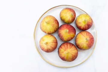 Fresh figs on a plate ready to enjoy.
