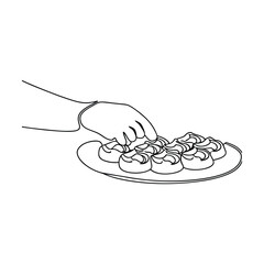 Hand Serving Delicious Mini Pastries on Elegant Plate