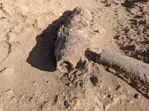 Close-up of Unexploded Ordnance in Dirt