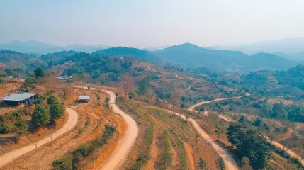 Winding dirt roads and hills in a rural countryside landscape