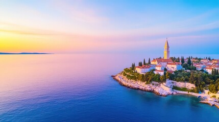 Naklejka premium Aerial view of Istrian Town Rovinj, Croatia just after the sunset Church of St Euphemia in the backhround