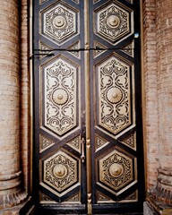 Ornate antique wooden door with intricate carvings
