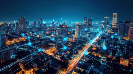 Obraz premium Night city skyline connected network. Aerial view of urban lights. Stock photo for technology, globalisation, and future concepts.