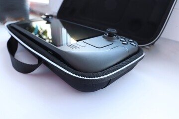 Steam Deck, a portable game console, 