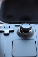 Steam Deck, a portable game console, 
