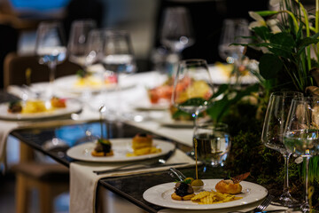 Elegant table decor for luxury dining with floral centerpieces