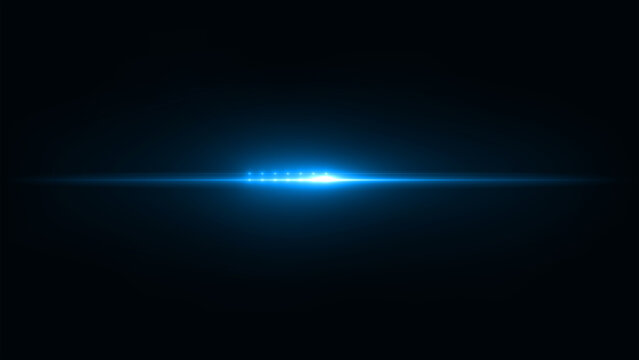 Beautiful light flares. Glowing streaks on dark background