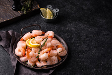 Frozen uncooked prawns or shrimps with lemon
