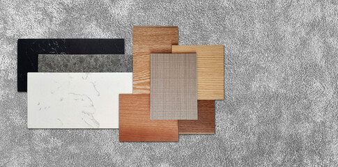 interior material samples board in top view including black, gray and white artificial stones, set...