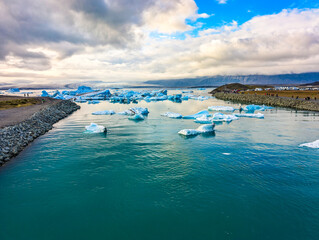 South Iceland, Diamond Beach. Beach with sparkling icebergs at sunset.
