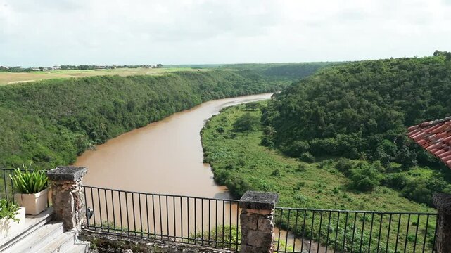 Zoom out shot from Altos de Chavon of the river Chavon and forest around ,travel in Dominican Republic.
