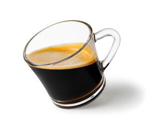 Transparent glass coffee cup tilting, containing dark espresso with layer of golden crema isolated on white background, creating dynamic and inviting image